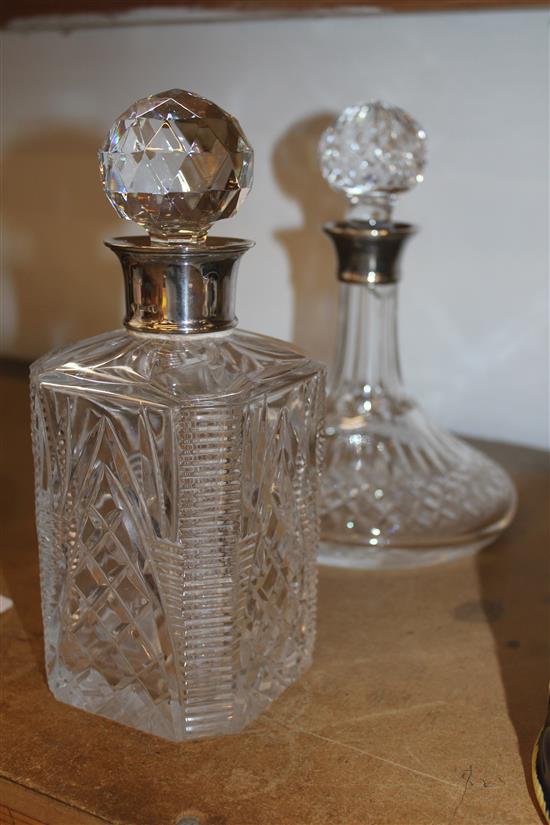Two silver mounted decanters (ships and spirit)